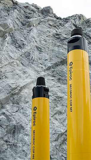 Top hammer drill rods